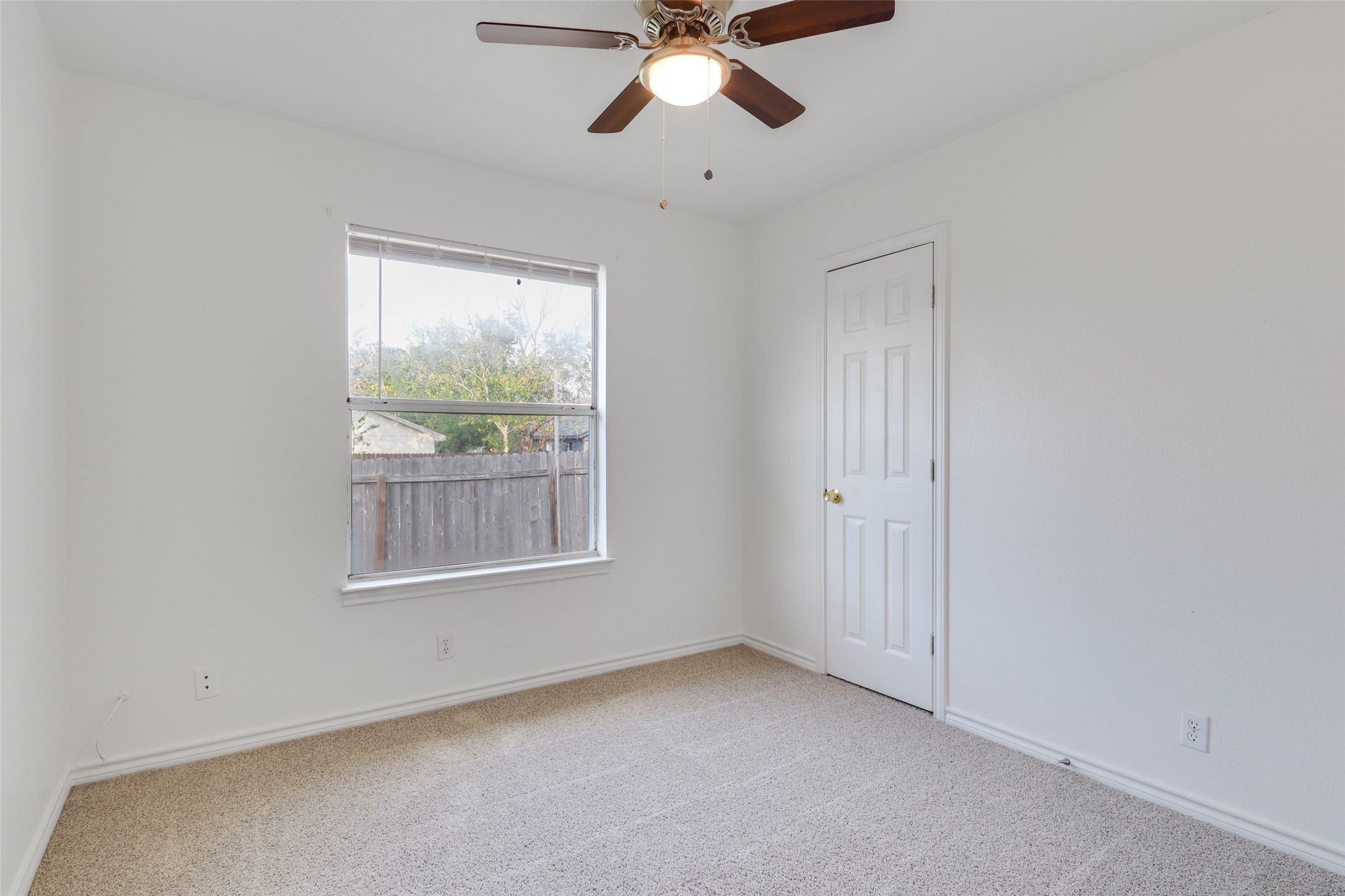 300 Tamara Drive, Unit A Georgetown, TX 78628 - Photo 9 of 12 a view of an empty room with a window