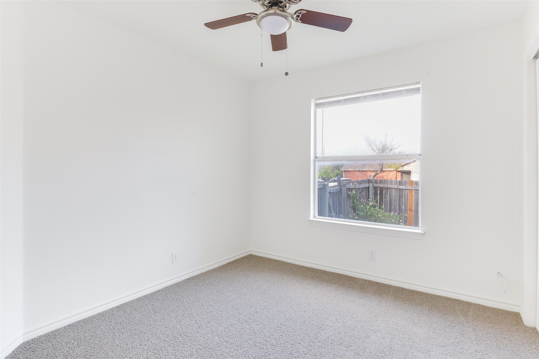 300 Tamara Drive, Unit A Georgetown, TX 78628 - Photo 10 of 12 an empty room with a window