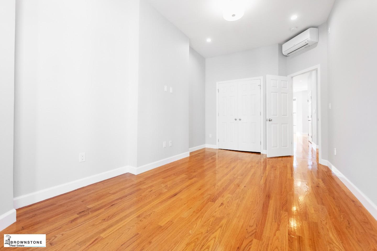 459 77th Street, Unit 3 Brooklyn, NY 11209 - Photo 7 of 9 a view of empty room with wooden floor