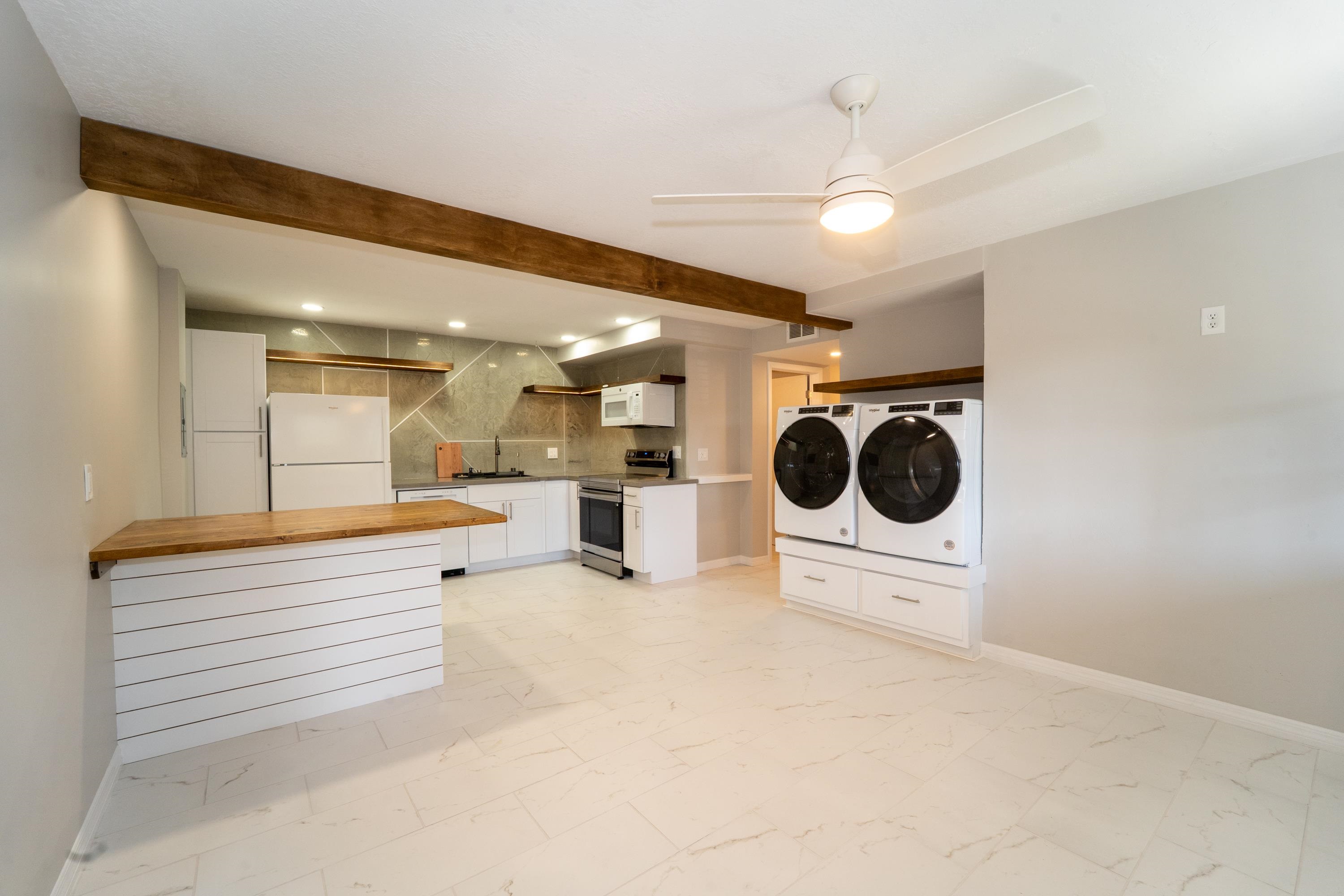 5455 Pelican Way, Unit B St. Augustine, FL 32080 - Photo 17 of 27 a view of a kitchen and a window
