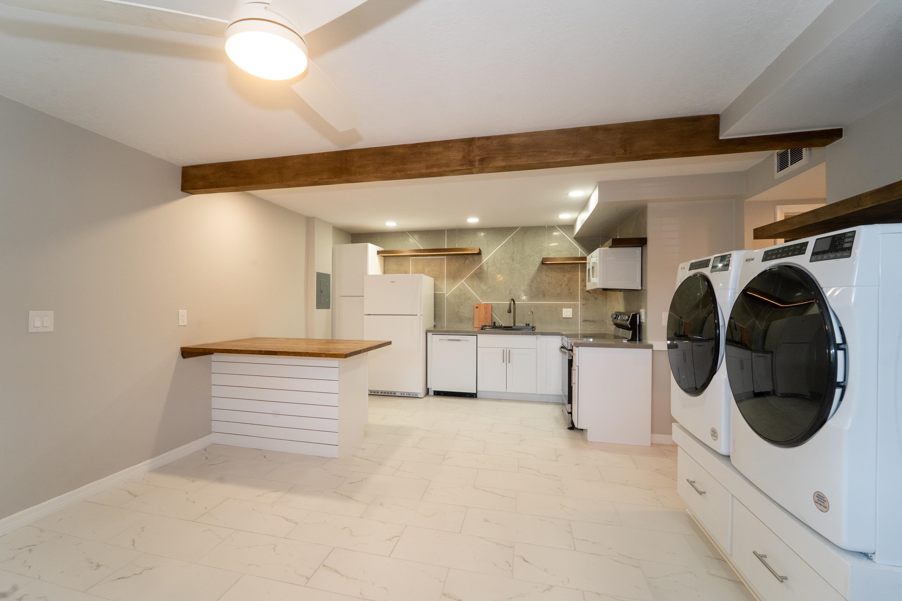 5455 Pelican Way, Unit B St. Augustine, FL 32080 - Photo 19 of 27 a bathroom with a sink and mirror