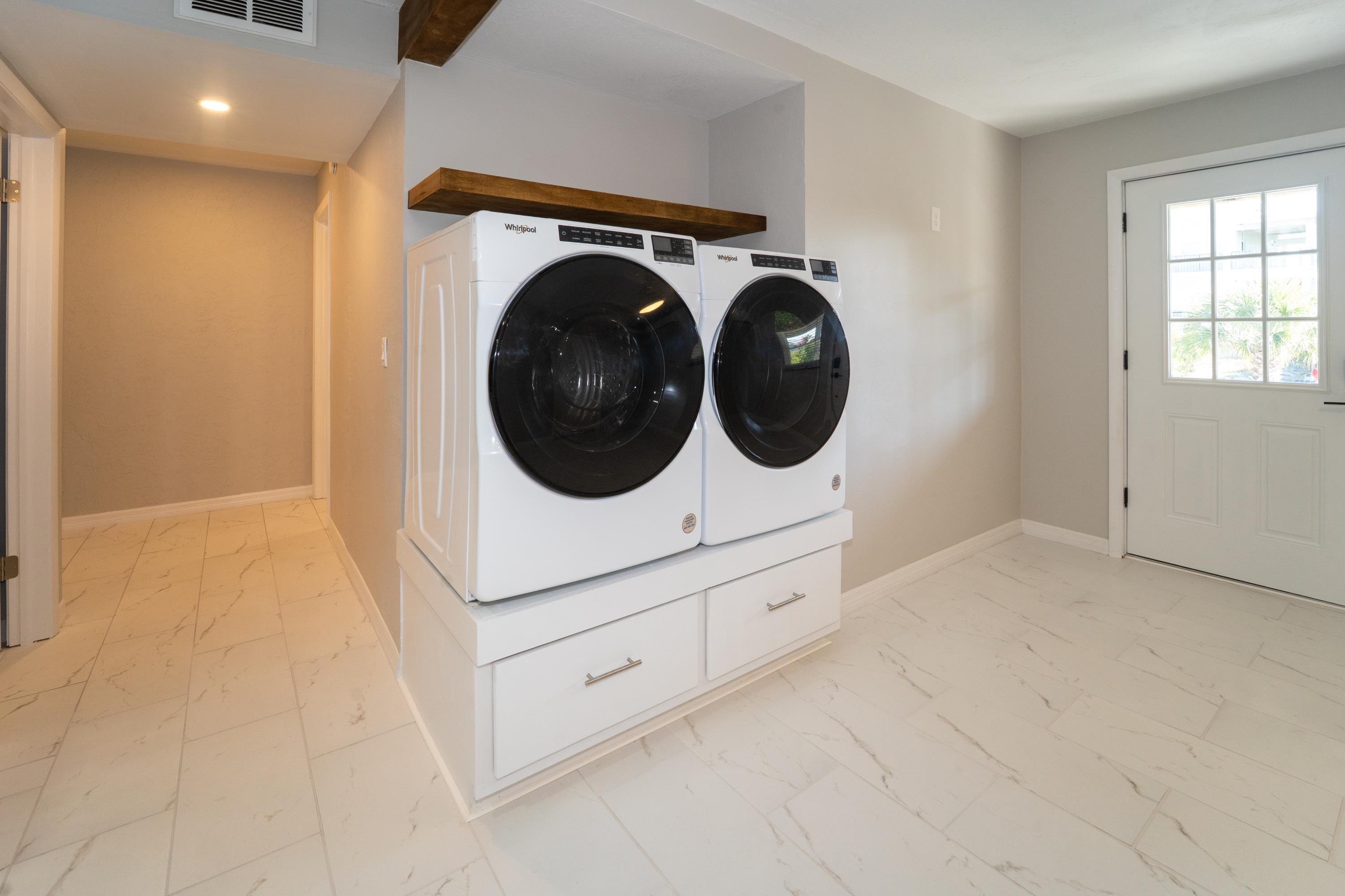 5455 Pelican Way, Unit B St. Augustine, FL 32080 - Photo 20 of 27 a utility room with dryer and washer