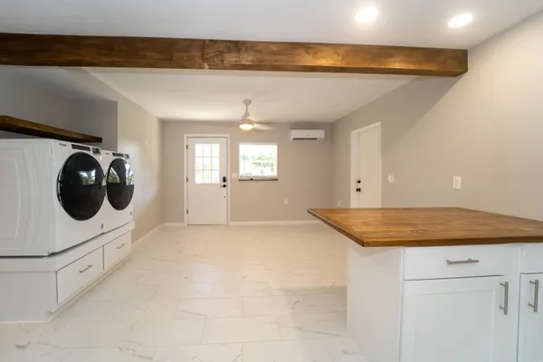 a view of an empty room with a window