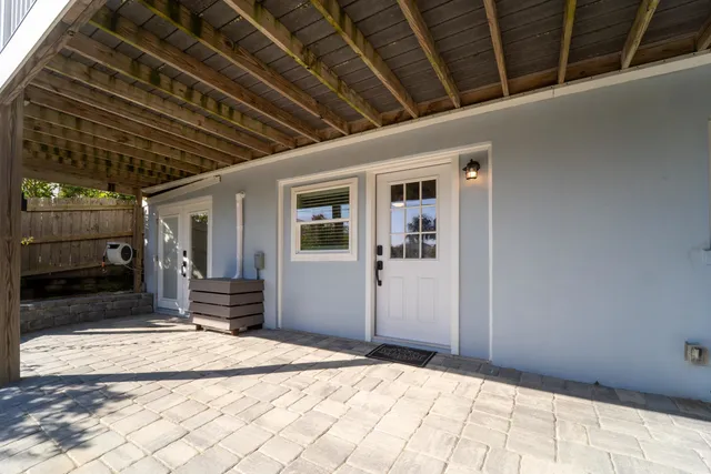 a view of sitting area in front of house