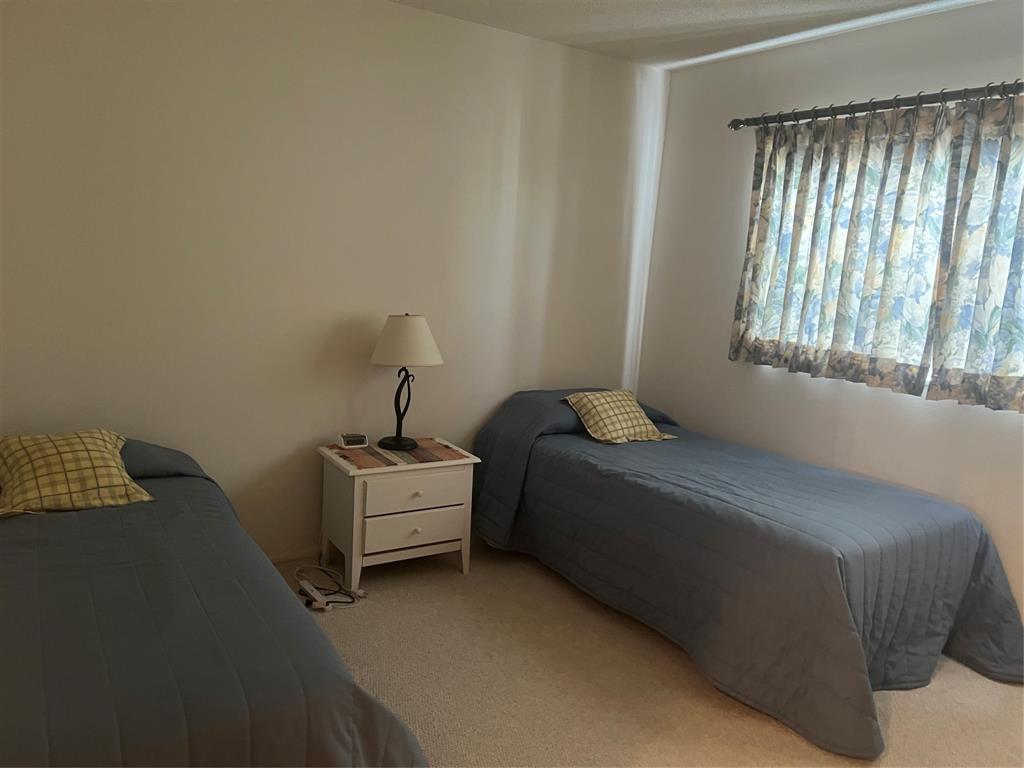 1425 Atlantic Shores Boulevard, Unit 601 Hallandale Beach, FL 33009 - Photo 17 of 23 a room with a bed and window