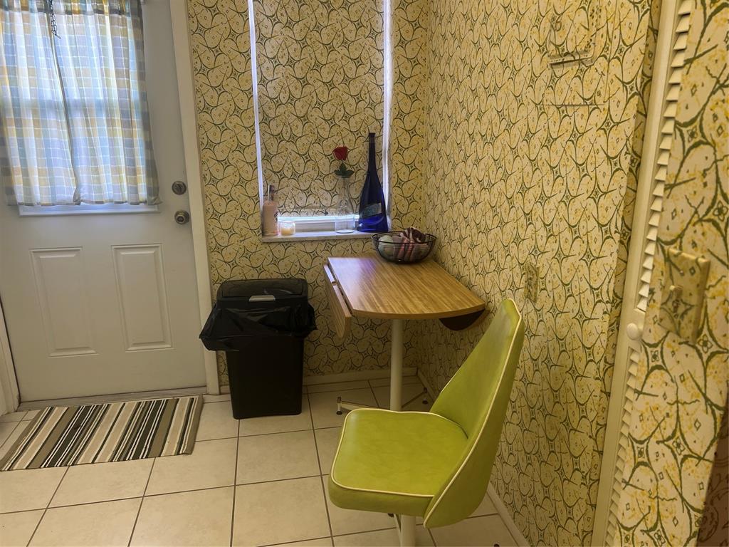 1425 Atlantic Shores Boulevard, Unit 601 Hallandale Beach, FL 33009 - Photo 2 of 23 a bathroom with a sink and a mirror