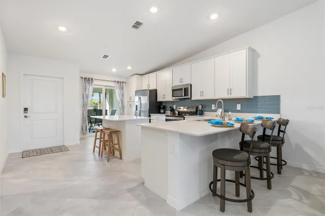 $389,000 | 17445 Opal Sand Drive, Unit 207, Venice, FL 34293