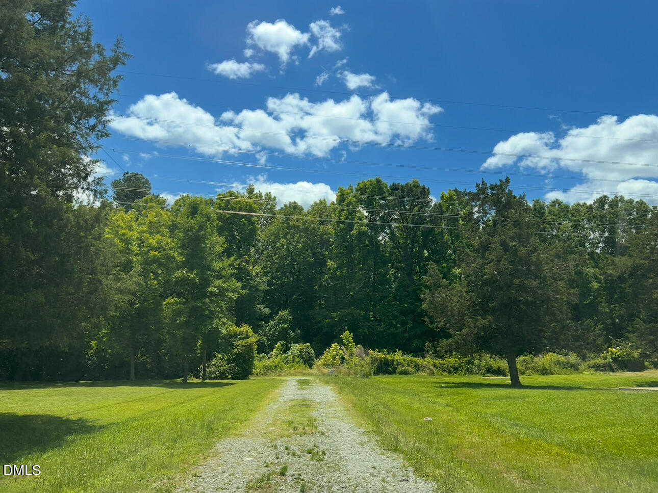 a view of a golf course with a lake