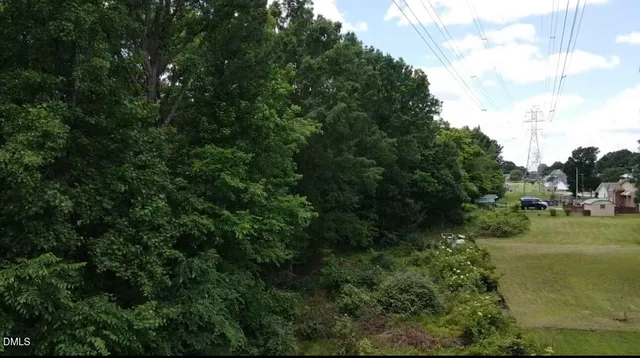 a view of a road with a yard