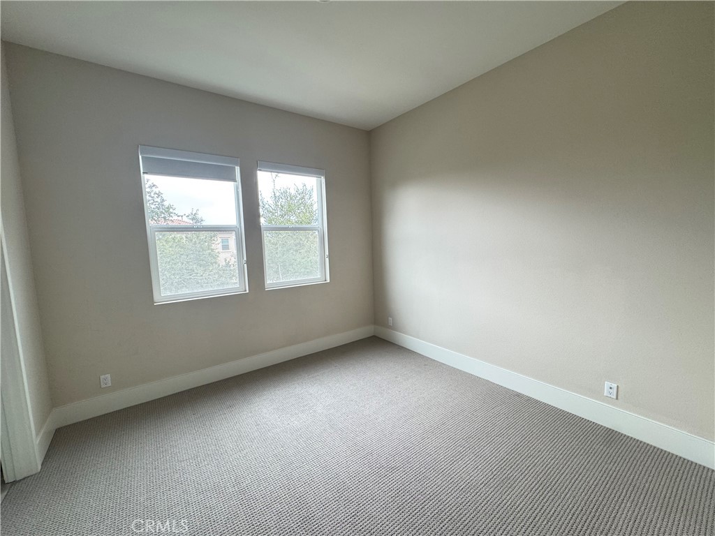 114 Crossover Irvine, CA 92618 - Photo 23 of 41 an empty room with a window