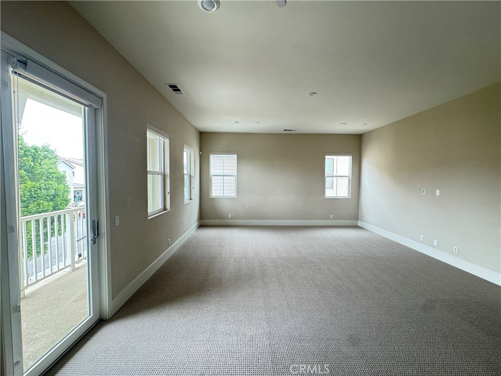 114 Crossover Irvine, CA 92618 - Photo 28 of 41 a view of an empty room with windows
