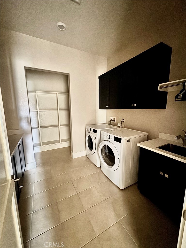 114 Crossover Irvine, CA 92618 - Photo 31 of 41 a utility room with dryer and washer