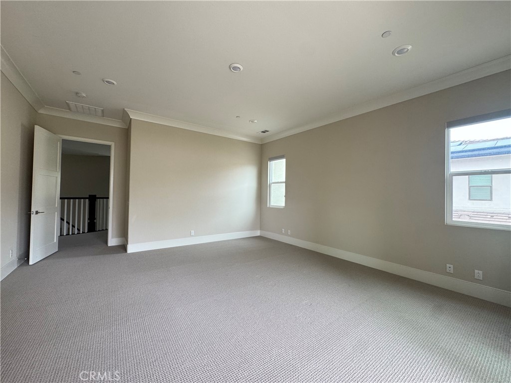 114 Crossover Irvine, CA 92618 - Photo 34 of 41 an empty room with windows