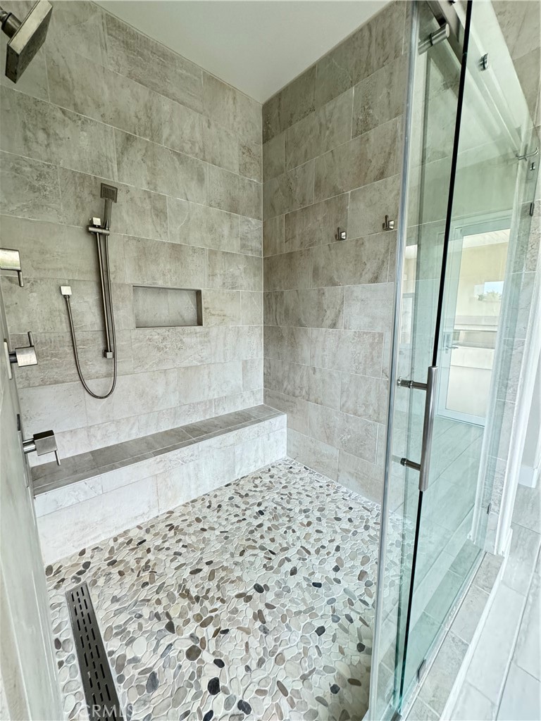 114 Crossover Irvine, CA 92618 - Photo 36 of 41 a bathroom with a shower