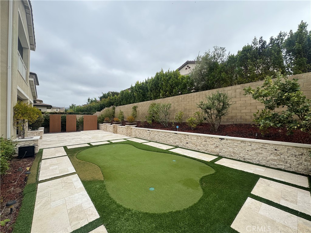 114 Crossover Irvine, CA 92618 - Photo 40 of 41 a view of a swimming pool with a patio