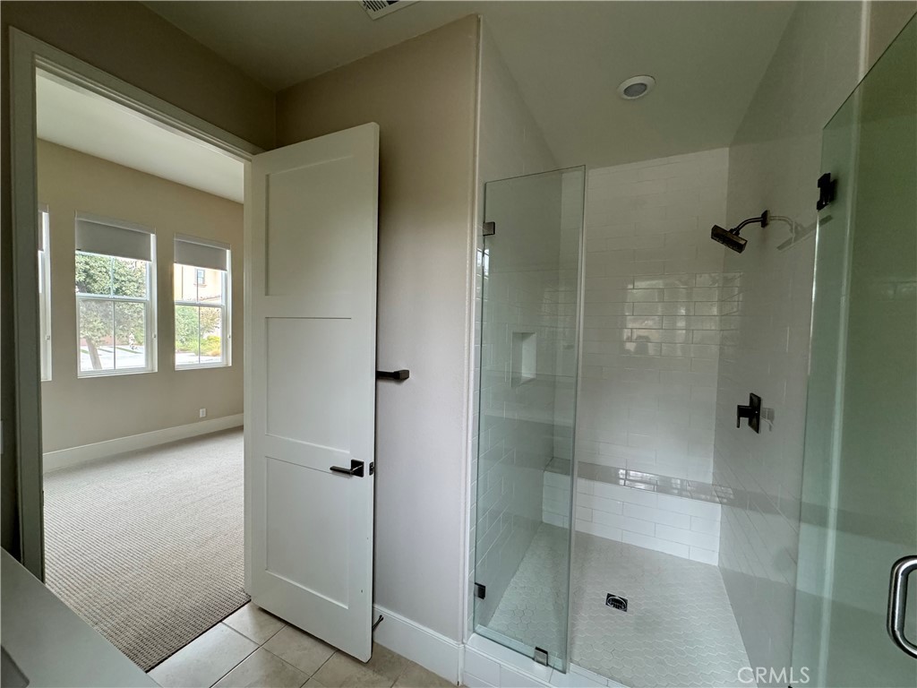 114 Crossover Irvine, CA 92618 - Photo 7 of 41 a bathroom with a shower