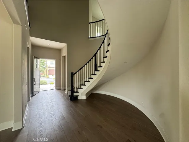 a view of entryway with wooden floor