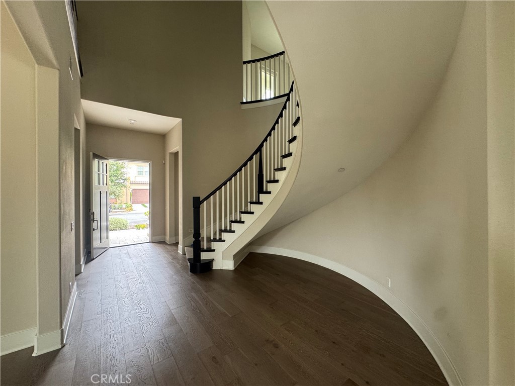 114 Crossover Irvine, CA 92618 - Photo 8 of 41 a view of entryway with wooden floor