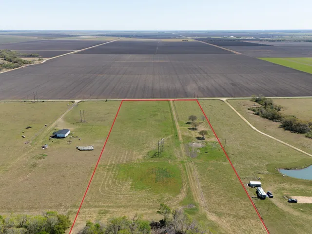 a view of a water with an ocean beach