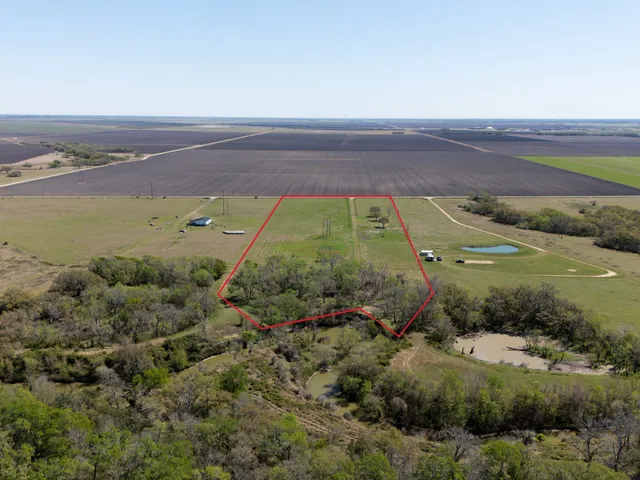 a view of an outdoor space and tennis court