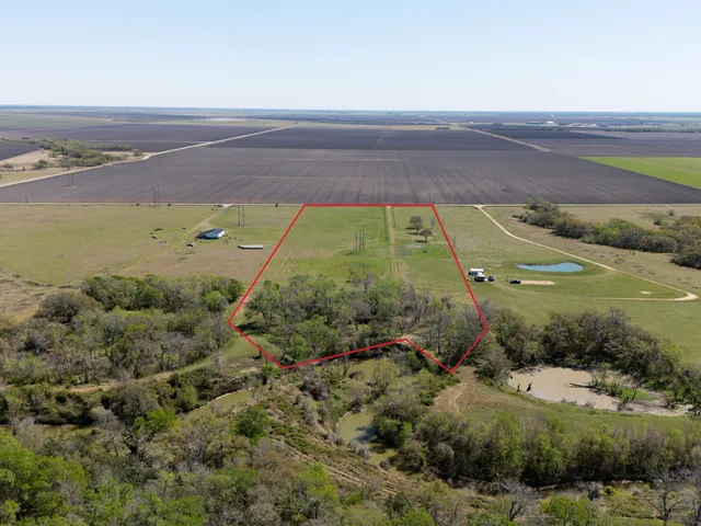 a view of lake with green space