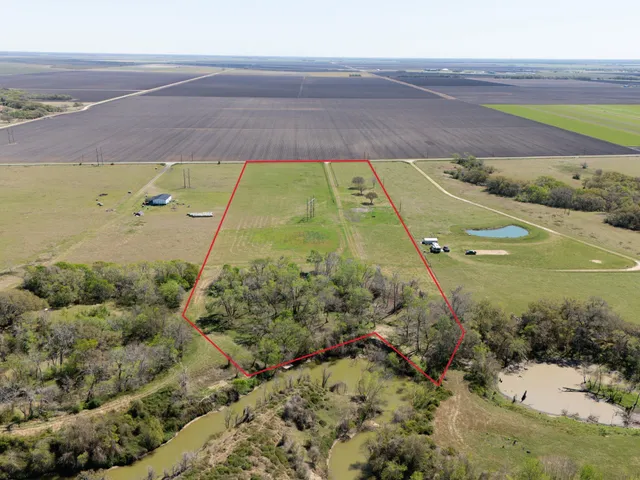 a view of a golf course with a lake