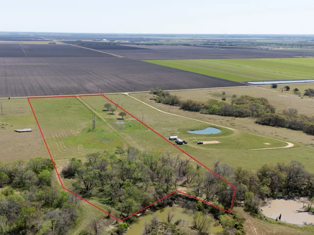 a view of a lake with a big yard