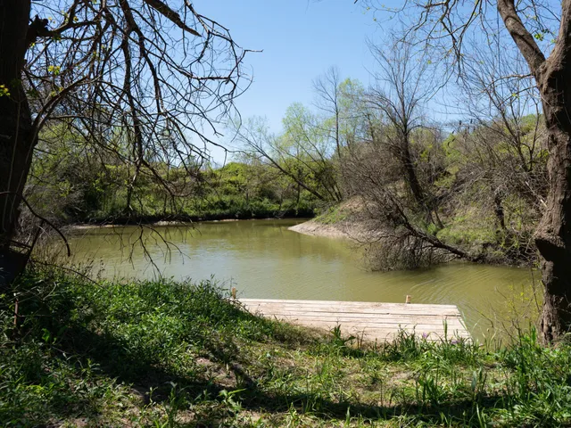 a view of a lake with houses in outdoor space