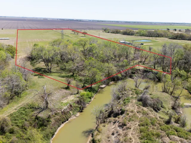 a view of outdoor space with trees all around