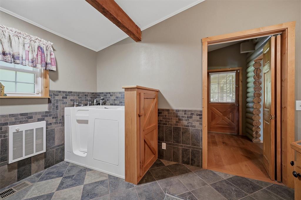 570 Ayres Road Bells, TX 75414 - Photo 22 of 40 a view of kitchen with washer and dryer