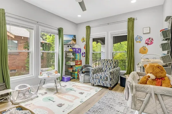 a living room with furniture and a window