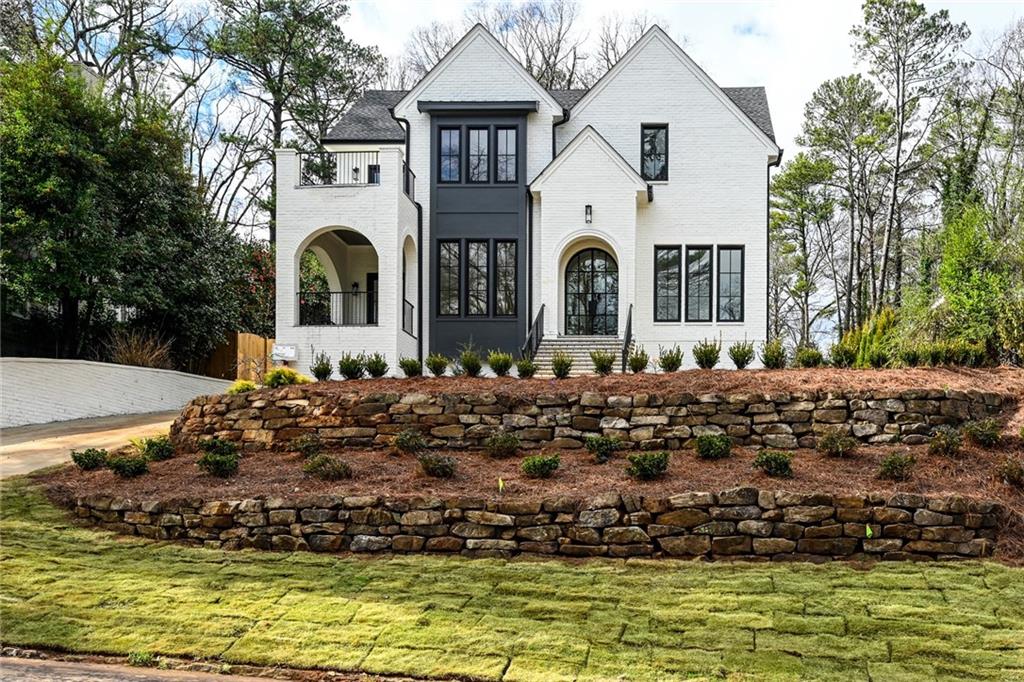 4072 North Ivy Road Northeast Atlanta, GA 30342 - Photo 1 of 1 a view of a house with swimming pool and sitting area