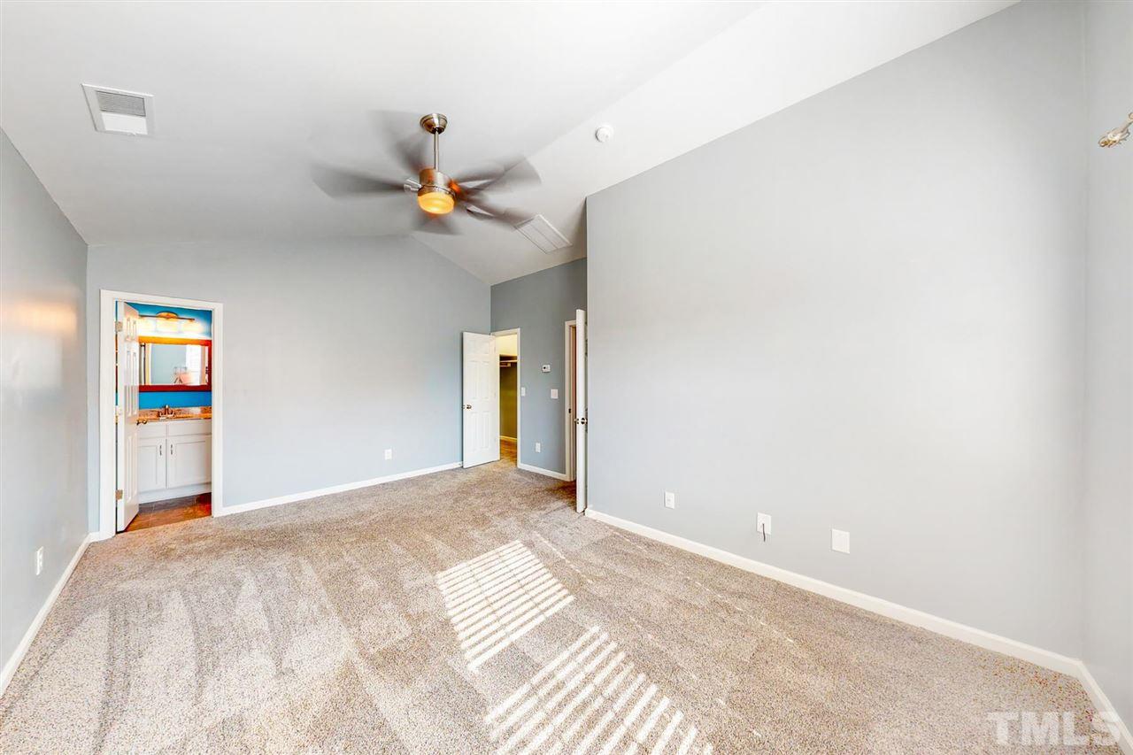 5309 Golden Moss Trail Raleigh, NC 27613 - Photo 17 of 25 a view of a room with a ceiling fan