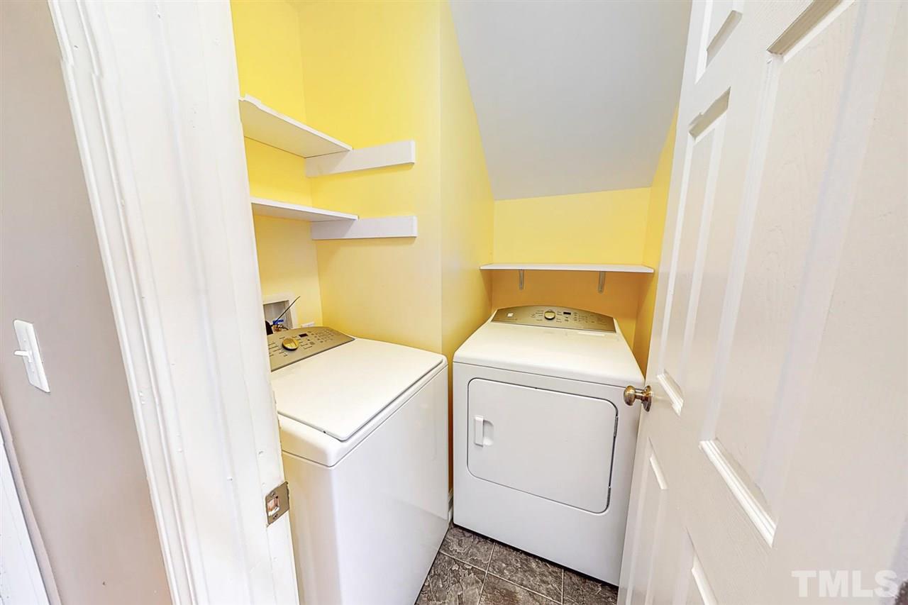 5309 Golden Moss Trail Raleigh, NC 27613 - Photo 20 of 25 a utility room with dryer and washer