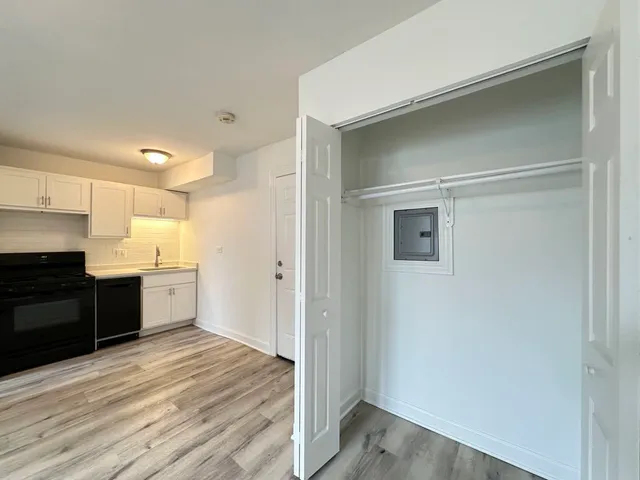 a bathroom with a sink toilet and vanity