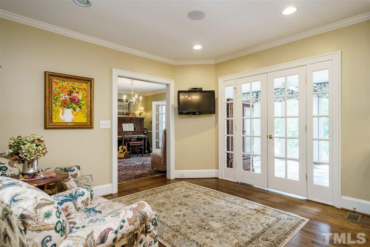 1501 St Marys Street Raleigh, NC 27608 - Photo 11 of 30 Located between the Sun Room and the Kitchen, this space easily houses some comfy chairs and a TV to keep the cooks company all hours during the day.