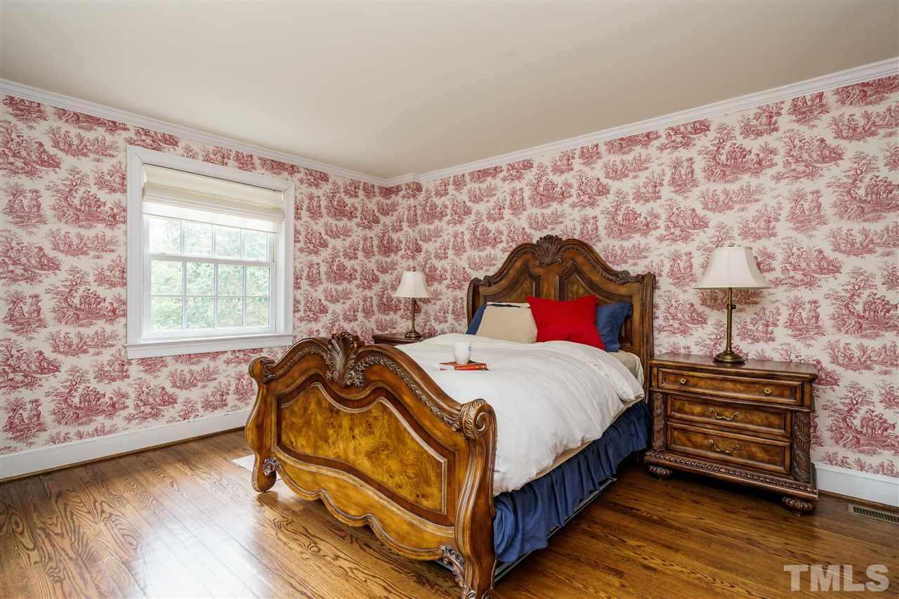 1501 St Marys Street Raleigh, NC 27608 - Photo 13 of 30 Incredible 1st fl guest suite with full bath, large closets, and private entrance off the Sunroom. Perfect for guests, mobility impaired parents, or college kids back home for the summer!