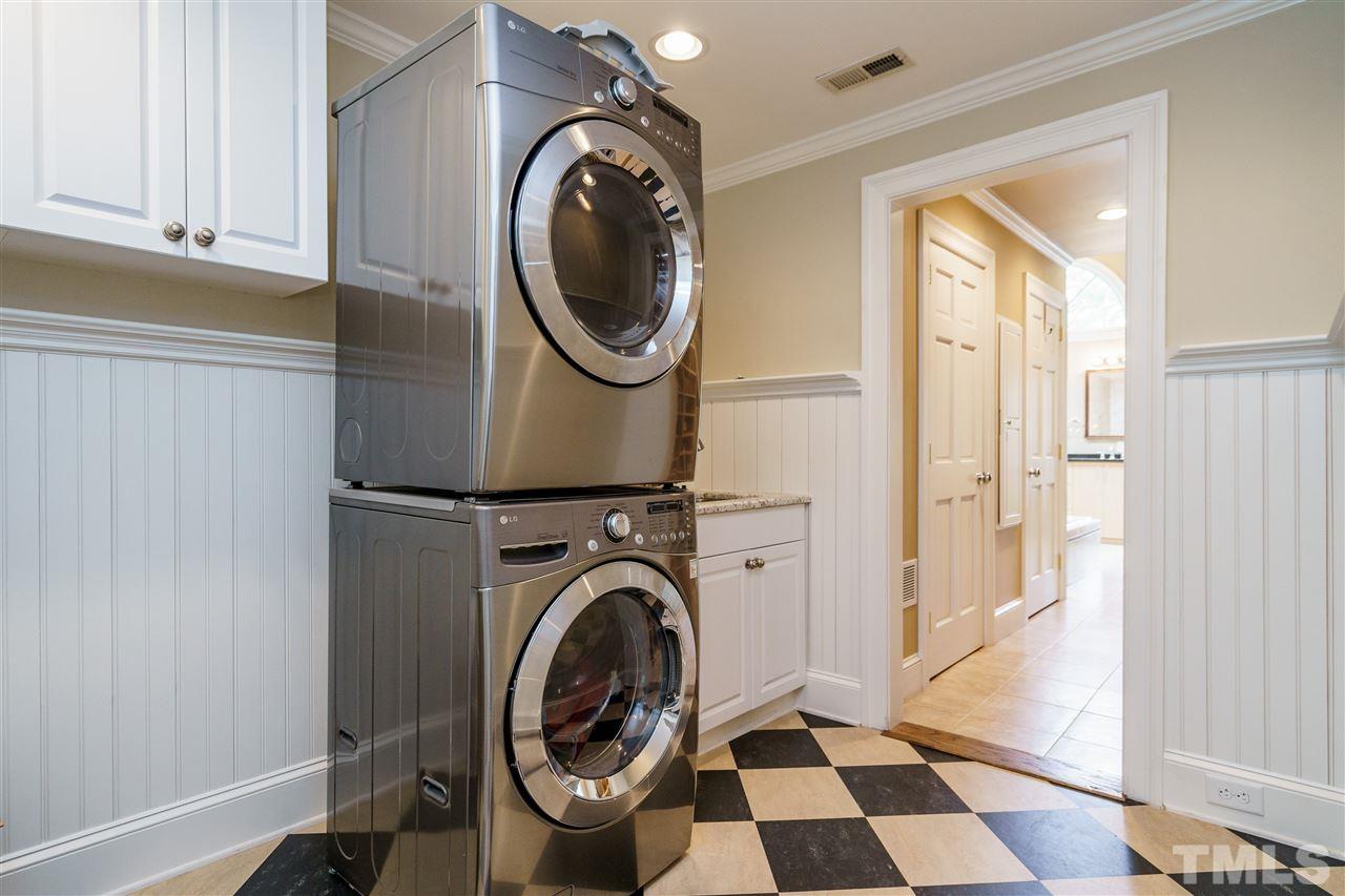 1501 St Marys Street Raleigh, NC 27608 - Photo 18 of 30 2nd floor laundry room, conveniently located near the bedrooms, offers plenty of space to fluff and fold.