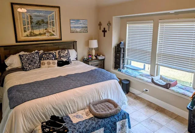 a bathroom with a sink toilet tub and shower