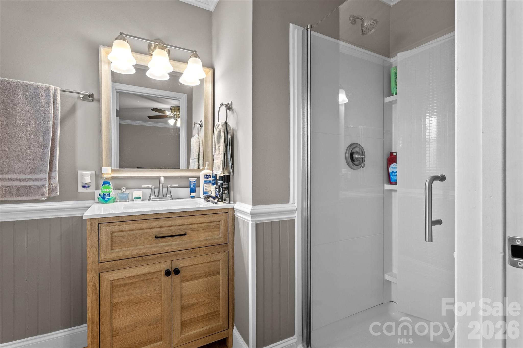 871 Saluda Road Chester, SC 29706 - Photo 22 of 46 a bathroom with a shower sink and mirror