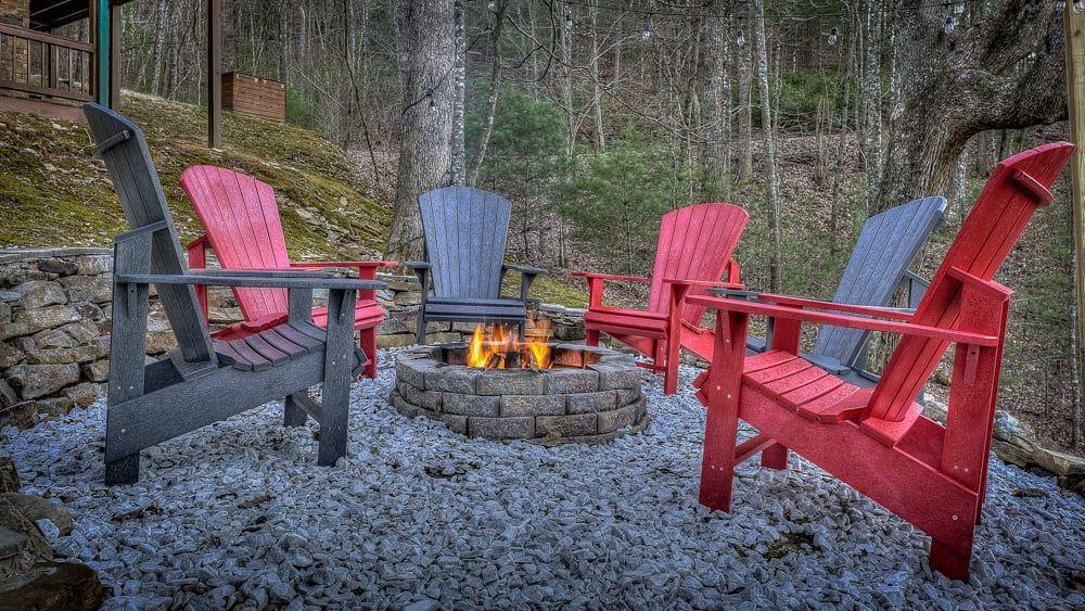 348 The Forest Has Eyes Blue Ridge, GA 30513 - Photo 23 of 49 a backyard of a house with seating space