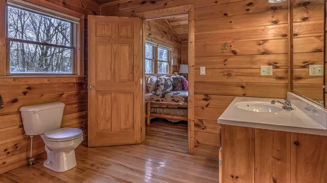 a view of a porch with wooden floor