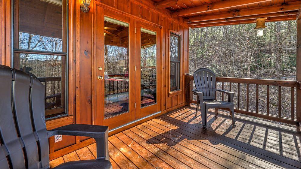 348 The Forest Has Eyes Blue Ridge, GA 30513 - Photo 45 of 49 a view of a balcony with wooden floor