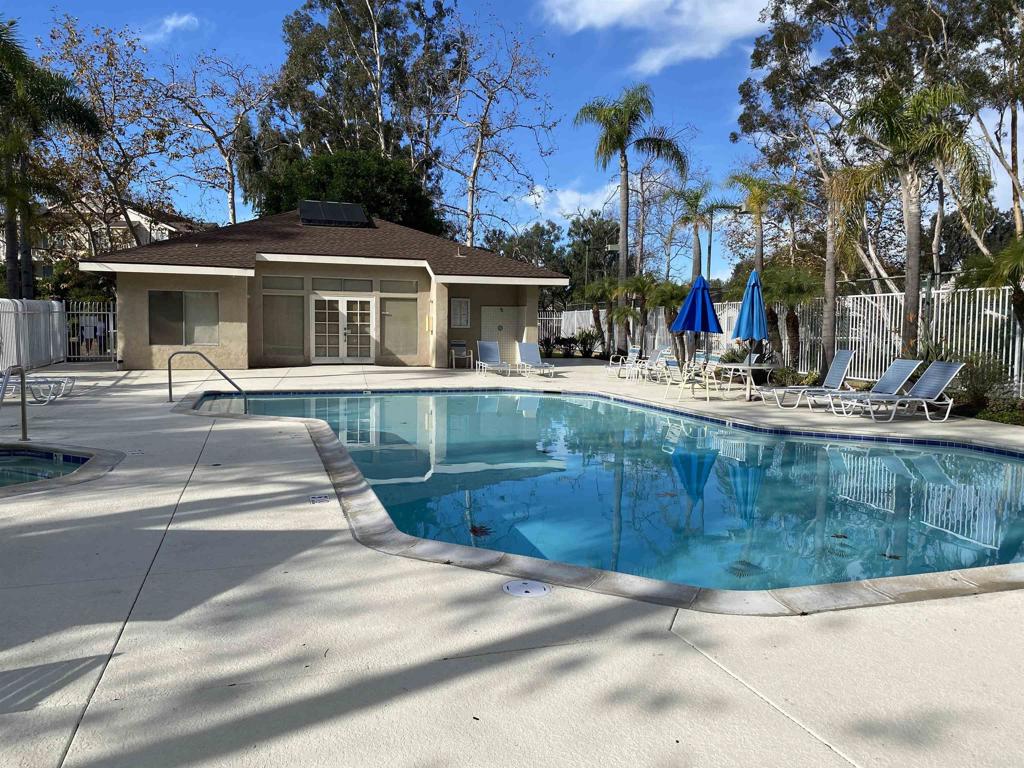 230 Diamond Way, Unit 148 Vista, CA 92083 - Photo 14 of 18 a front view of a house with a yard