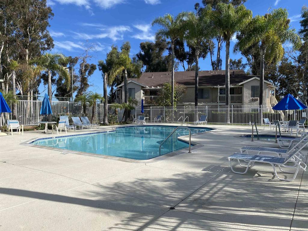 230 Diamond Way, Unit 148 Vista, CA 92083 - Photo 15 of 18 a view of a park with palm trees