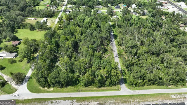 a view of a yard with an outdoor space