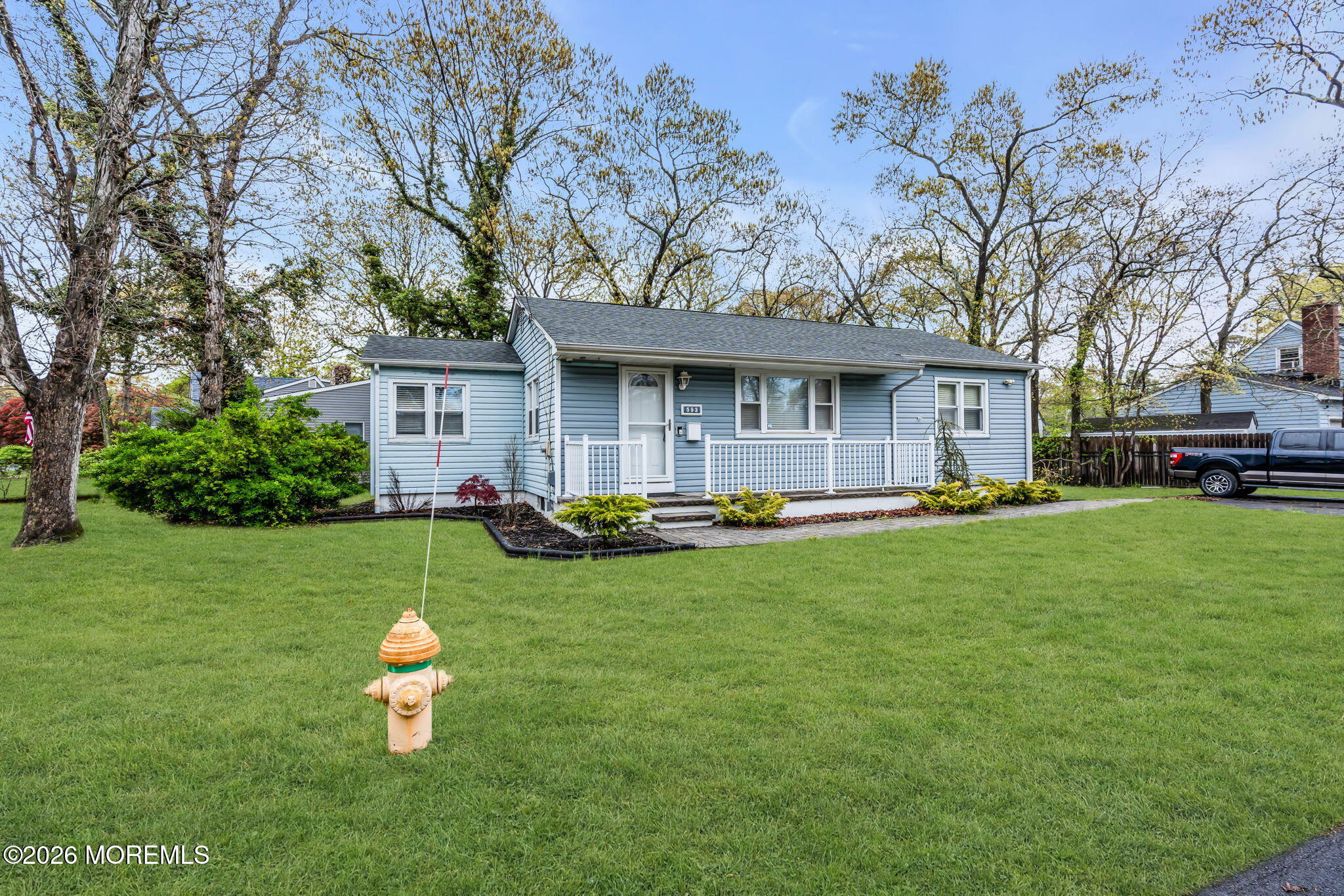 593 Beach Plum Road Brick, NJ 08723 - Photo 7 of 38 a view of a house with backyard and sitting area