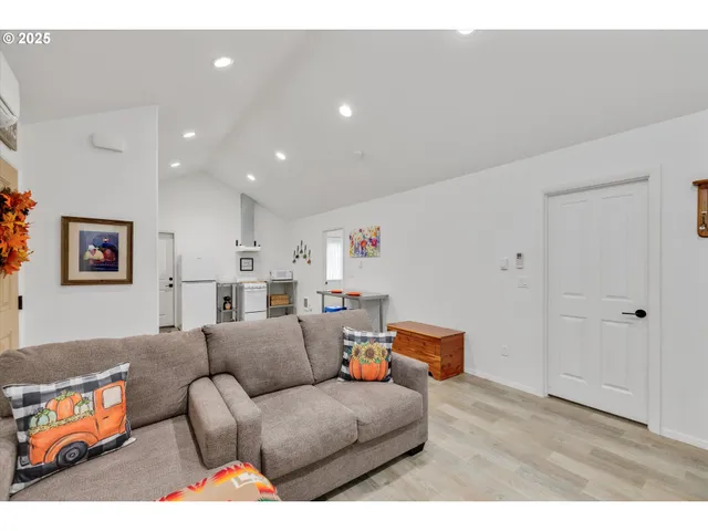 a living room with furniture and a couch