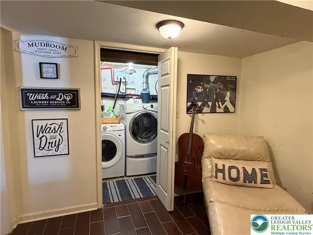 a utility room with dryer and washer
