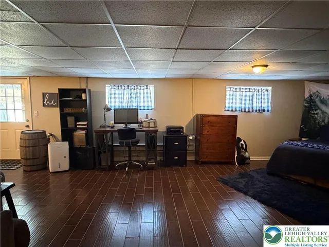 a view of workspace with wooden floor